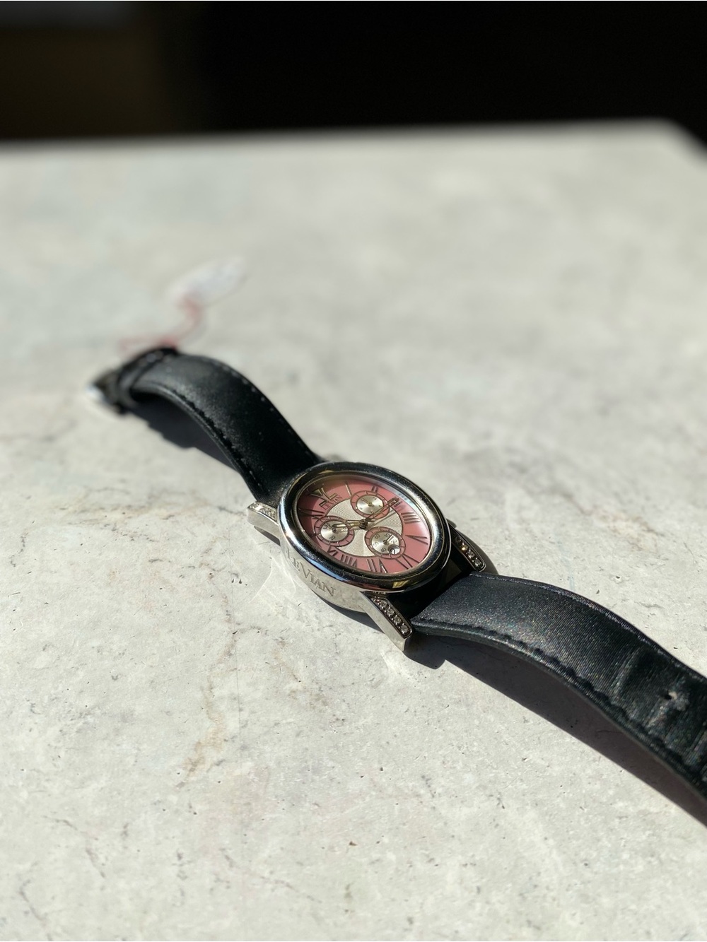 Levian Pink Dial Women's Watch with Black Leather Strap